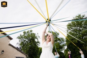 In Poitiers, Vienne, at the reception venue, the bouquet ribbon cutting takes place during the cocktail hour.